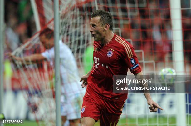 Bayern Munich's Croatian striker Ivica Olic celebrates scoring during the UEFA Champions League second leg quarter-final football match FC Bayern...