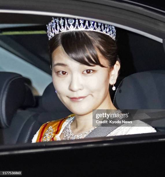 Japanese Princess Mako is driven to the Imperial Palace in Tokyo on Oct. 22, 2019 to attend a banquet being held following Emperor Naruhito's...