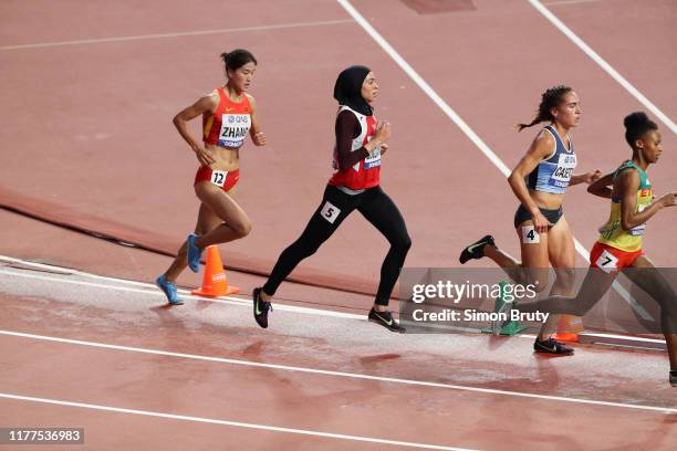 World Athletics Championships: China Zhang Xinyan and Tunsia Marwa Bouzayani in action duirng Women's 3000M Steeplechase Heats at Khalifa...