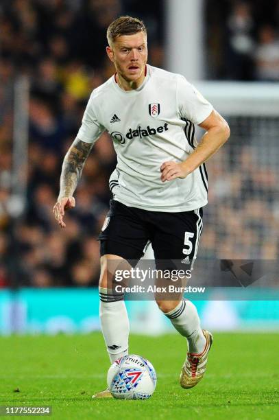 Alfie Mawson of Fulham runs with the ball during the Sky Bet Championship match between Fulham and Wigan Athletic at Craven Cottage on September 27,...