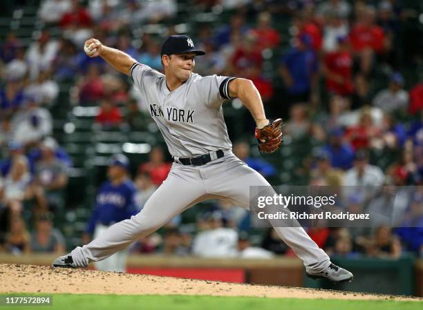 Chance Adams of the New York Yankees pitches in the ninth inning against the Texas Rangers at Globe Life Park in Arlington on September 27, 2019 in...