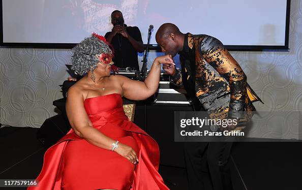 Devoe Singer Flo DeVoe and singer Kem onstage during DeVoe Family Celebration ...