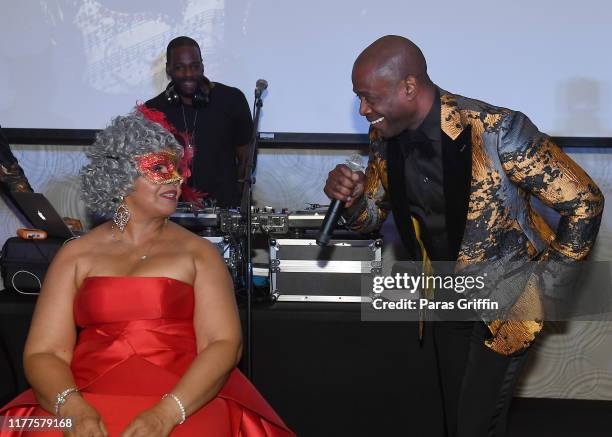 Devoe Singer Flo DeVoe and singer Kem onstage during DeVoe Family Celebration ...