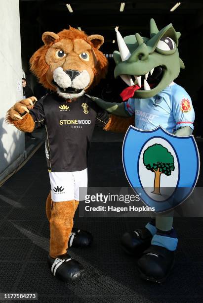 Team mascot Leo the Lion of Wellington and the Northland Taniwha pose during the round 8 Mitre 10 Cup match between Wellington and Northland at...