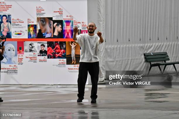 Fashion designer Satoshi Kondo walks the runway during the Issey Miyake Ready to Wear Spring/Summer 2020 fashion show as part of Paris Fashion Week...