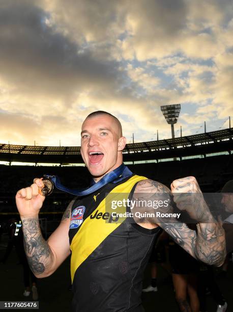 Dustin Martin of the Tigers celebrates winning the 2019 AFL Grand Final match between the Richmond Tigers and the Greater Western Sydney Giants at...