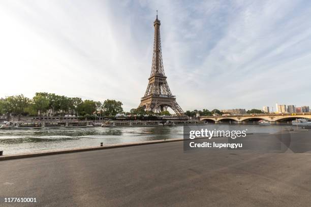 road of paris with eiffel tower at morning - paris france street stock pictures, royalty-free photos & images