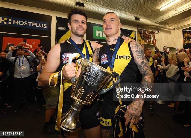 Trent Cotchin and Dustin Martin of the Tigers celebrate winning the 2019 AFL Grand Final match between the Richmond Tigers and the Greater Western...