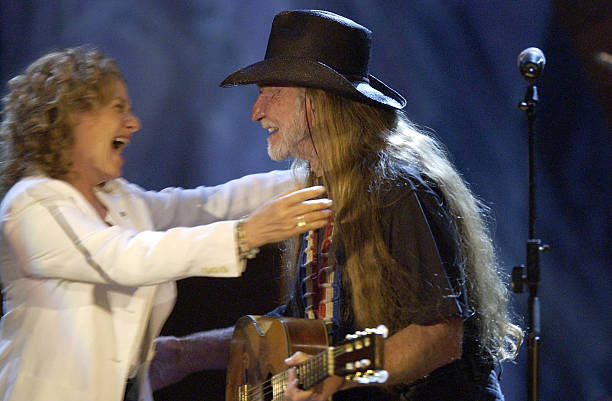 Carole King and Willie Nelson during Willie Nelson and Friends: "Outlaws & Angels" - Show and Backstage at Wiltern Theatre in Los Angeles,...