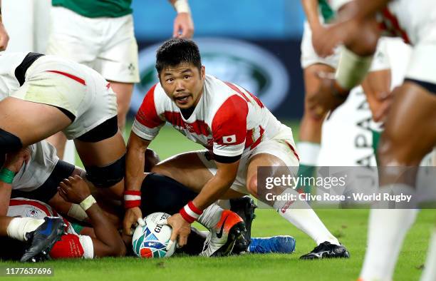 Fumiaki Tanaka of Japan looks to offload the ball during the Rugby World Cup 2019 Group A game between Japan and Ireland at Shizuoka Stadium Ecopa on...