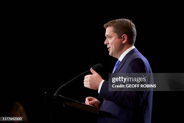 Conservative leader Andrew Scheer speaks at a press conference in Regina, Saskatchewan, October 22, 2019. - A weakened Prime Minister Justin Trudeau...