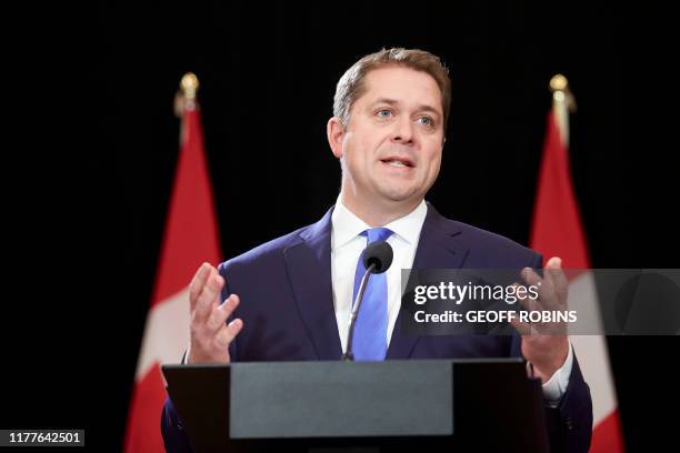 Conservative leader Andrew Scheer speaks at a press conference in Regina, Saskatchewan, October 22, 2019. - A weakened Prime Minister Justin Trudeau...