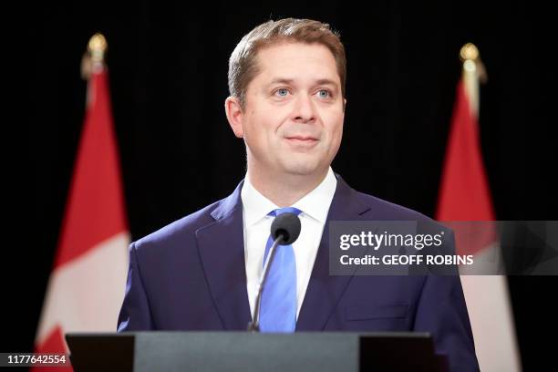 Conservative leader Andrew Scheer speaks at a press conference in Regina, Saskatchewan, October 22, 2019. - A weakened Prime Minister Justin Trudeau...