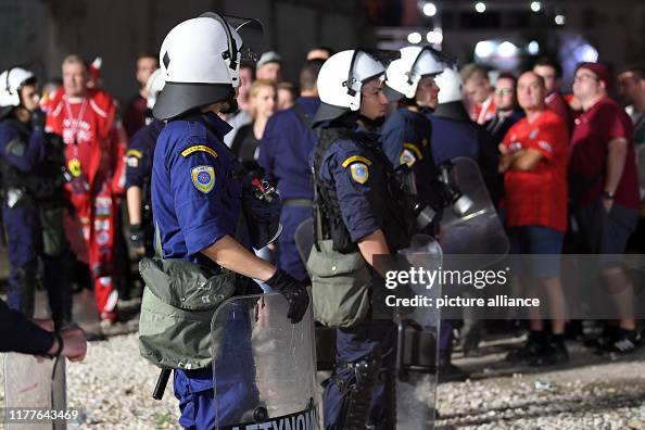 Hooligans Riot Greek policemen are guarding fans of FC Bayern Munich. Around 80 ...