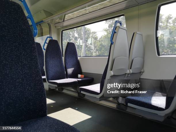 on a train - train interior fotografías e imágenes de stock