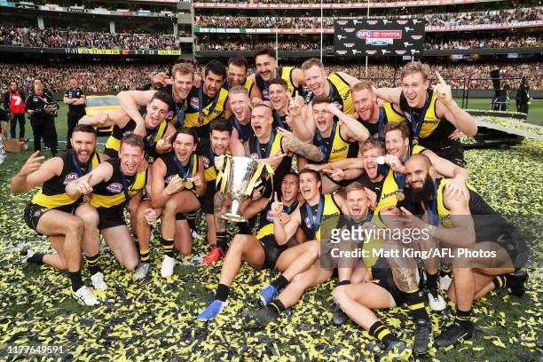 The Richmond Tigers celebrate victory after the 2019 AFL Grand Final match between the Richmond Tigers and the Greater Western Sydney Giants at...
