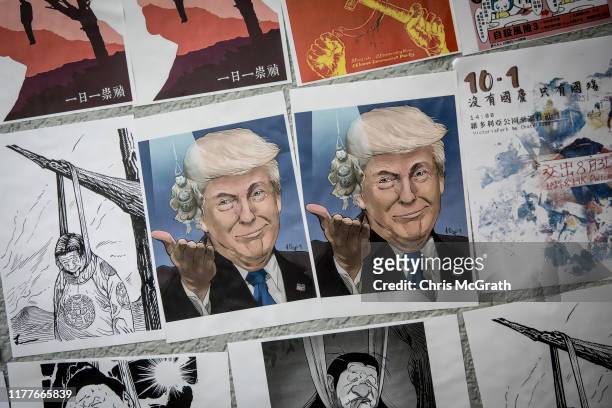 Poster showing U.S President Donald Trump is seen on a pro-democracy " Lennon Wall" ahead of a rally to mark the fifth anniversary of the 2014...