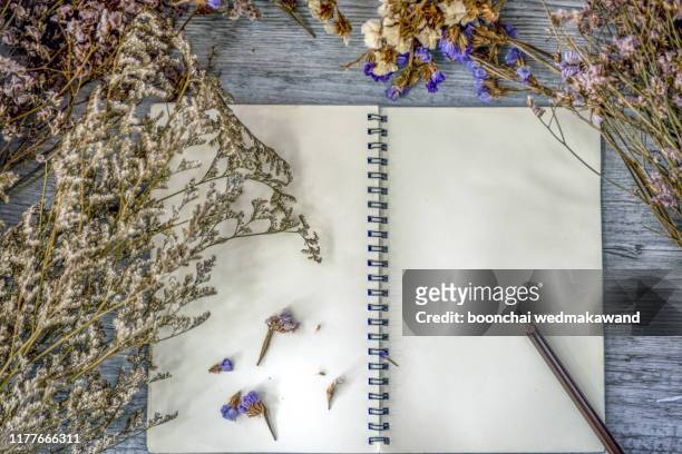 school notebook with pencil on table - book top view stockfoto's en -beelden