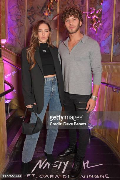 Delilah Belle Hamlin and Eyal Booker attend the launch of Nasty Gal Ft. Cara Delevingne, a collection of holiday-ready pieces inspired by female rock...