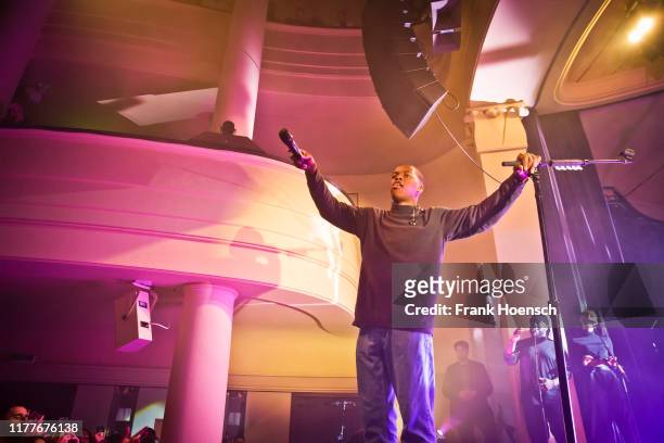 Canadian singer Daniel Caesar performs live on stage during a concert at the Metropol on October 22, 2019 in Berlin, Germany.