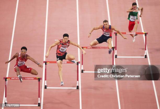 Abderrahman Samba of Qatar, Takatoshi Abe of Japan, Vít Muller of the Czech Republic and Fernando Vega of Mexico compete in the Men's 400 metres...