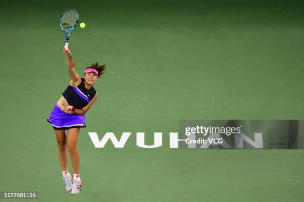 Duan Yingying of China severs in the doubles final match against Elise Mertens of Belgium and Aryna Sabalenka of Belarus on Day seven of 2019...