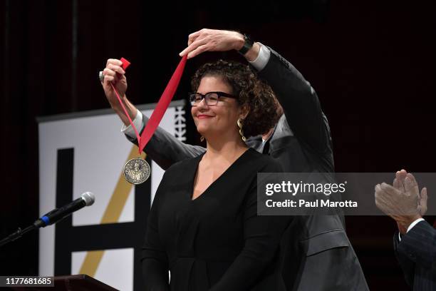 Award recipient Elizabeth Alexander is seen on stage at the 2019 Hutchins Center Honors W.E.B. Du Bois Medal Ceremony at Harvard University on...