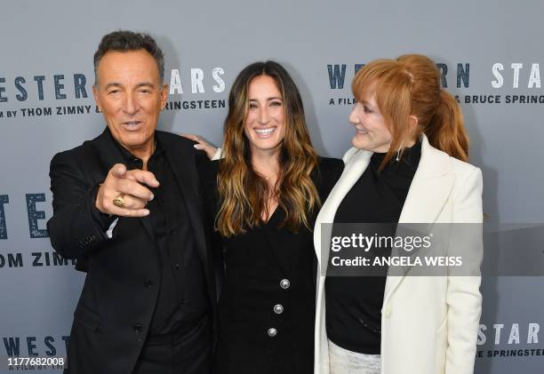 In this file photo taken on October 16, 2019 US singer-songwriter Bruce Springsteen, his daughter Jessica Springsteen and his wife Patti Scialfa...
