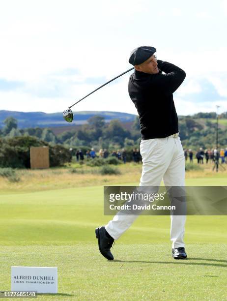 Vinnie Jones of England the former soccer star and Hollywood actor plays a shot during the third round of the Alfred Dunhill Links Championship on...