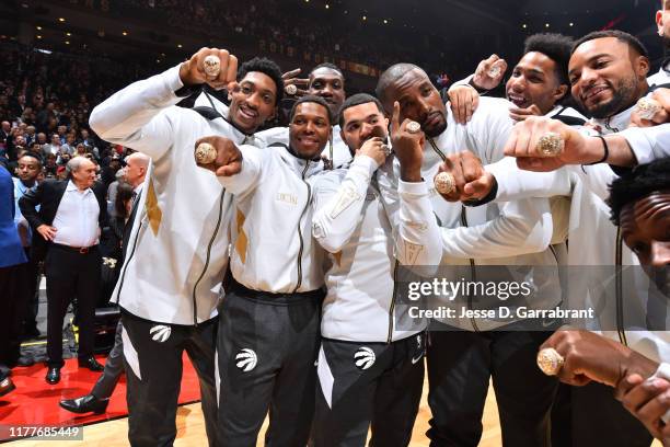 The Toronto Raptors pose for a photo with their 2019 Championship Rings prior to a game against the New Orleans Pelicans on October 22, 2019 at the...