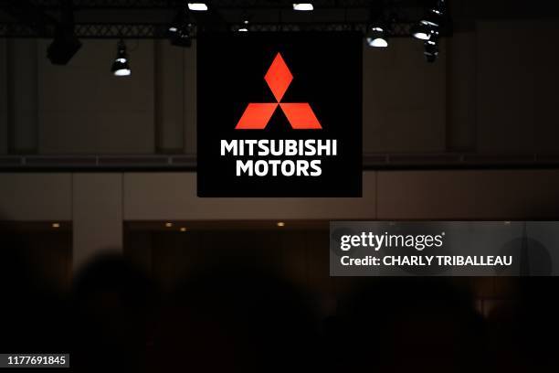 The Mitsubishi Motors logo is pictured during the Tokyo Motor Show in Tokyo on October 23, 2019.