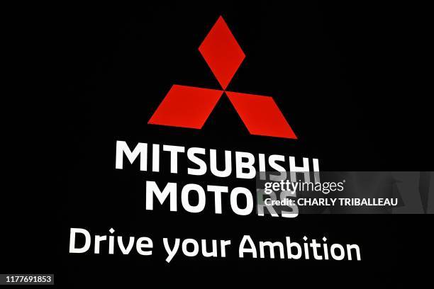 The Mitsubishi Motors logo is pictured during the Tokyo Motor Show in Tokyo on October 23, 2019.