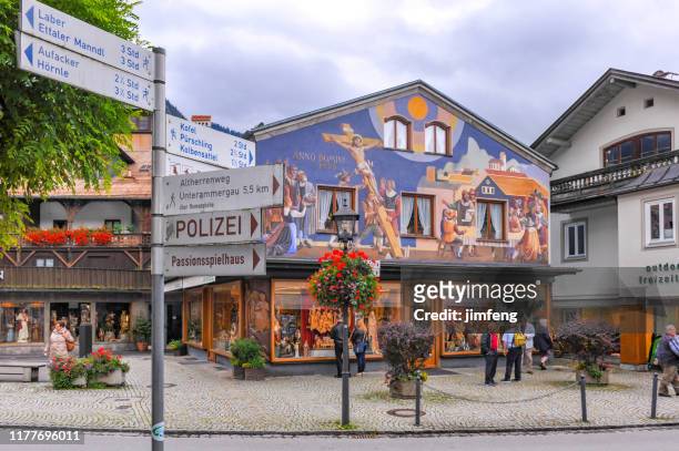 the street view of oberammergau, germany - oberammergau stock pictures, royalty-free photos & images