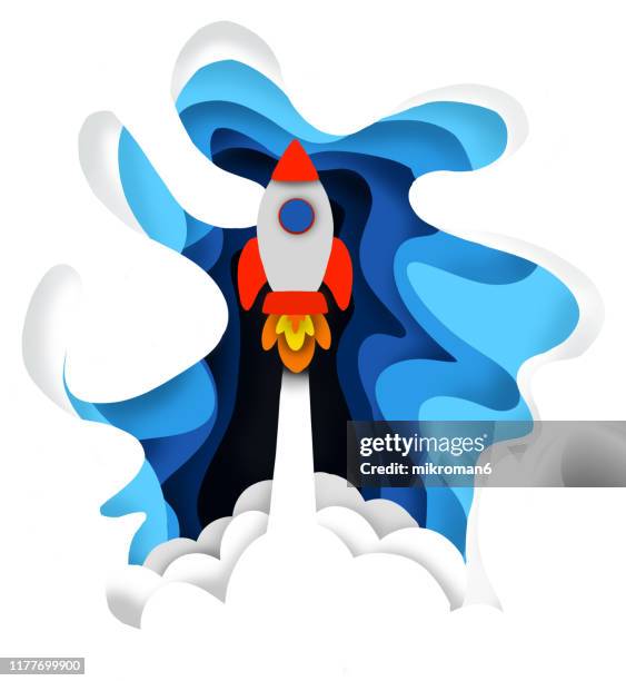 rocket shutting into the sky illustration - paper cut stock-fotos und bilder