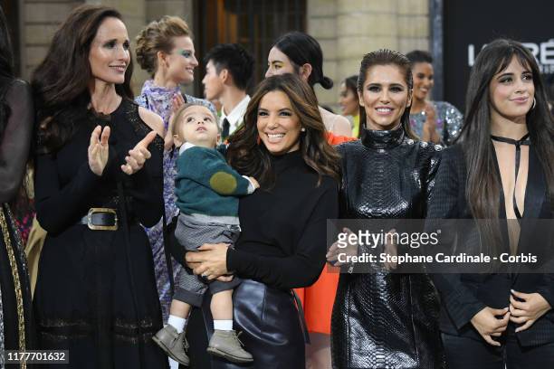 Andie MacDowell, Eva Longoria and her son Santiago, Cheryl Cole and Camila Cabello pose on the runway during the "Le Defile L'Oreal Paris" Show as...