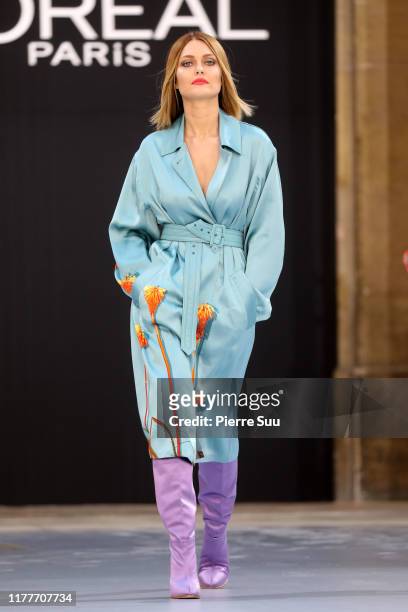 Caroline Receveur walks the runway during the "Le Defile L'Oreal Paris" Show as part of Paris Fashion Week on September 28, 2019 in Paris, France.