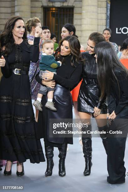 Andie MacDowell, Eva Longoria and her son Santiago, Cheryl Cole and Camila Cabello pose on the runway during the "Le Defile L'Oreal Paris" Show as...