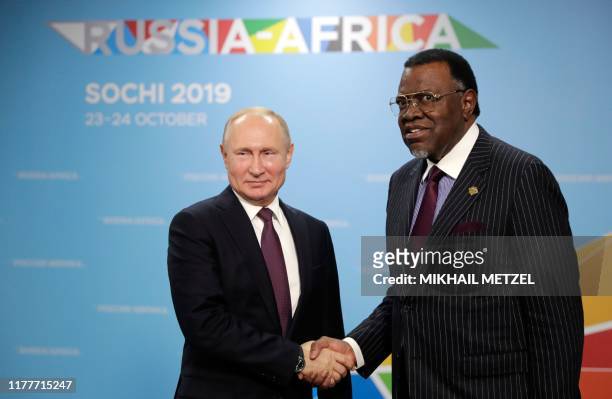 Russian President Vladimir Putin meets with President of Namibia Hage Geingob on the sidelines of the 2019 Russia-Africa Summit in Sochi on October...