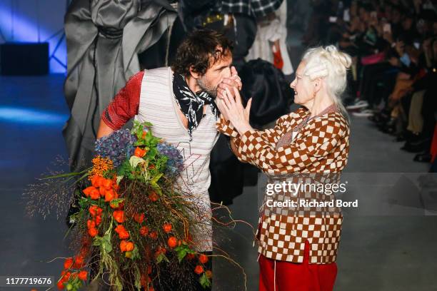 Andreas Kronthaler and Vivienne Westwood share a kiss during the Vivienne Westwood Womenswear Spring/Summer 2020 show as part of Paris Fashion Week...