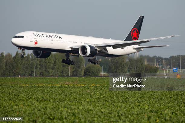 Air Canada Boeing 777-300 aircraft as seen on final approach landing at Amsterdam Schiphol International Airport AMS EHAM in The Netherlands. The...