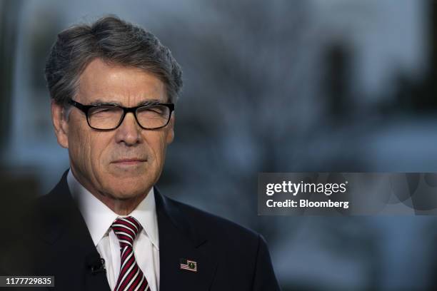 Rick Perry, U.S. Secretary of energy, pauses while speaking to members of the media outside the White House in Washington, D.C., U.S., on Wednesday,...