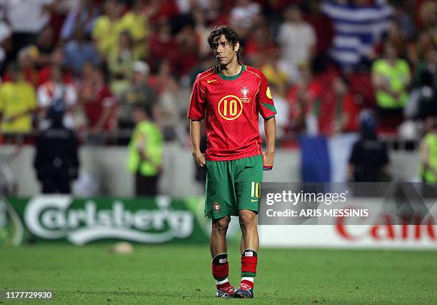 Portuguese midfielder Rui Costa looks dejected, 04 July 2004 at the Luz stadium in Lisbon after the Euro 2004 final football match between Portugal...