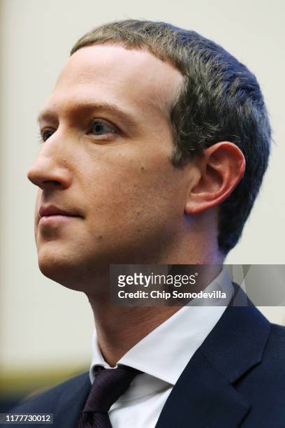 Facebook co-founder and CEO Mark Zuckerberg arrives to testify before the House Financial Services Committee in the Rayburn House Office Building on...