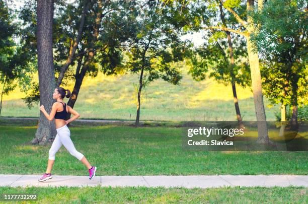 Spring Running Woman 3,757 Running Trail Spring Stock Photos, High-Res Pictures, and Images ...