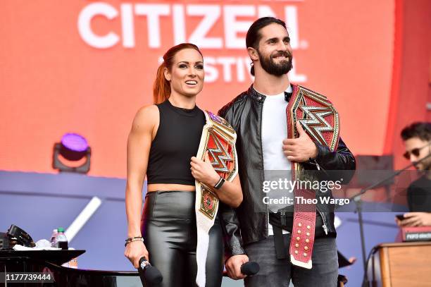 Becky Lynch and Seth Rollins speak onstage during the 2019 Global Citizen Festival: Power The Movement in Central Park on September 28, 2019 in New...