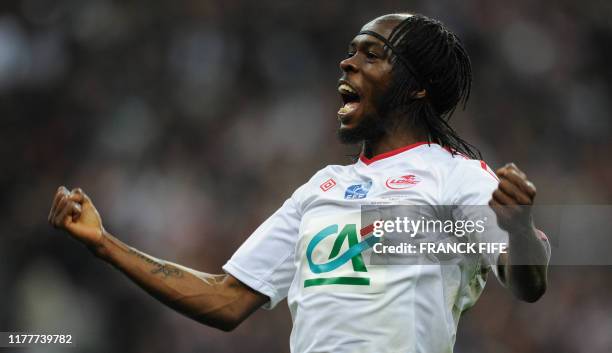 Lille's Ivorian forward Gervinho celebrates after the goal scored by his teammate Lille's Polonese midfielder Ludovic Obraniak during the French Cup...
