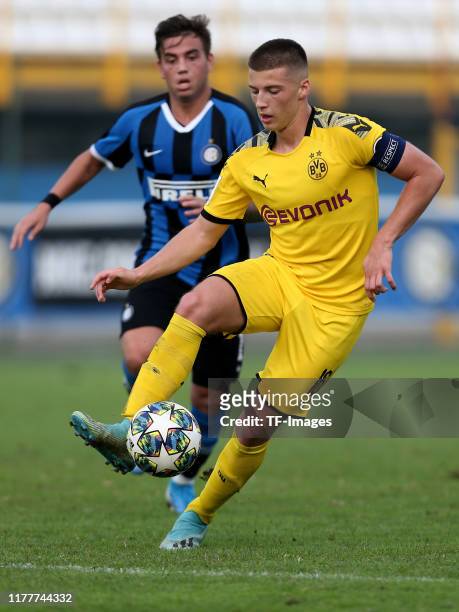 Matias Fonseca of Inter Mailand U19 and Niccolo Squizzato of Inter Mailand U19 battle for the ball during the UEFA Youth League match between Inter...