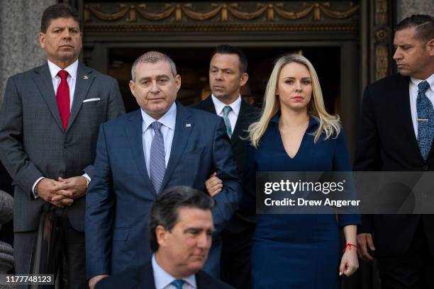 Lev Parnas his wife Svetlana Parnas depart federal court following an arraignment hearing on October 23, 2019 in New York City. Lev Parnas and Igor...