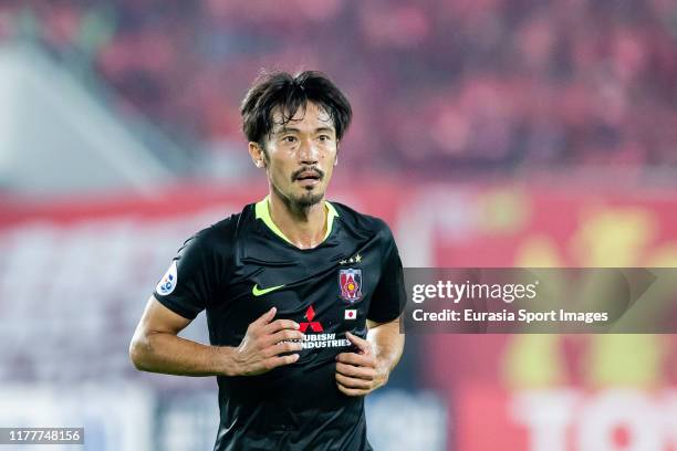 Yuki Abe of Urawa Red Diamonds reacts during the AFC Champions League Semi Final second leg match between Guangzhou Evergrande and Urawa Red Diamonds...