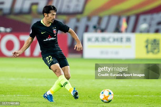 Yuki Abe of Urawa Red Diamonds in action during the AFC Champions League Semi Final second leg match between Guangzhou Evergrande and Urawa Red...